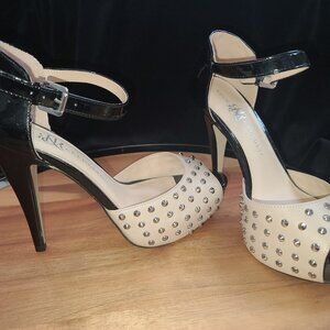 Stiletto does with ankle strap and metal studs